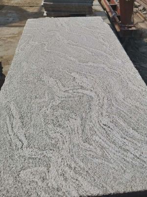 大漠流金與浪淘沙花崗巖石材 優質墻體干掛與批發加工全解析